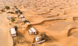 aerial view of abandoned village in a desert near dubai