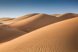Sand dunes in Liwa desert, in Abu  Dhabi, UAE, at sunrise