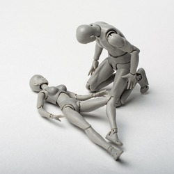 The male figurine bent over the recumbent body of the female figurine. Feel regret for what you have done. Ask for forgiveness.