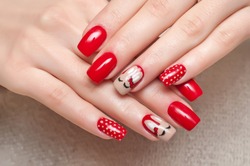 red manicure with rabbits