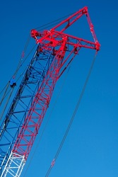 Crawler Crane or Luffing Jib Crawler Crane on blue sky background
