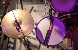 Drums, cymbals, hi hat on a beautiful background in the recording Studio. Room for musicians ' rehearsals. The concept of musical creativity and show business.