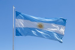 Flag of Argentina. Argentine flag against a blue sky