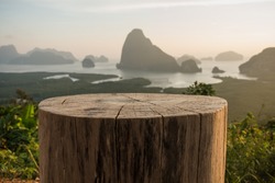 tree stump Chair with Sa-met-nang-she mountain views landmark in Phang nga ,Thailand.