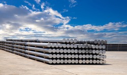 industrial raw materials, heap of aluminium bar in aluminium profiles factory.