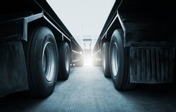 Semi Trailer Trucks The Parking Lot at the Warehouse. Big Rig Semi Truck Wheels Tires. Shipping Trucks. Lorry Tractor. Industry Freight Truck Logistics Cargo Transport.	