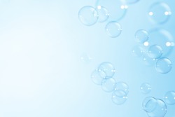 Soap bubbles on blue background