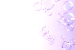 Soap bubbles on purple background