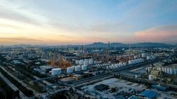 Aerial view of Oil and gas industry - refinery, Shot from drone of Oil refinery and Petrochemical plant at twilight, Rayong, Thailand
