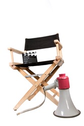 vintage megaphone and clapperboard on directors chair