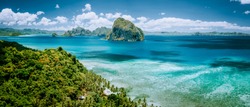 Panoramic aerial view of tropical Palawan island with unique Pinagbuyutan island on horizon. El Nido-Philippines Southeast Asia Bacuit archipelago