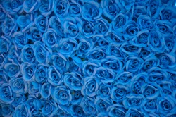 The blue flower. the blue flower made from plastic Fiber. Artificial flowers made from synthetic fabrics.