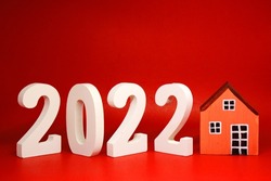 New House 2022 on ฺRed  background - new year trend 2022 - red pattern business concept of Real Estate, Home Property for Sale and rent - copy space , promotion design advertise