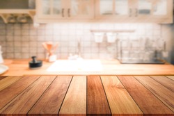 Empty wooden table and blurred kitchen background for display or montage your products