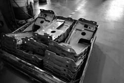Car parts Produced by Sheet Metal Stamping Tool Die. Black-and-white photo.