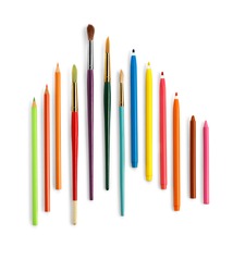 Set of pencils paint brushes and colorful crayons against white background. Clipping path