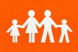 happy paper family on a bright orange background.
