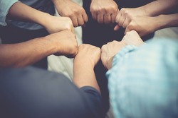 Business workers with hands bumping fists.Teamwork partnership fist bump finish dealing mission.People fist bump hands together. Trust teamwork people business mission completely agree deal concept.