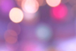 Abstract bokeh background. Colorful blue pink purple bokeh defocused lights christmas new year abstract blur background.