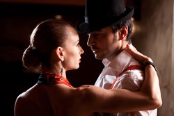 Close-up of a man and a woman dancing argentinian tango.