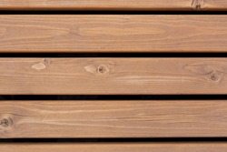 A wooden bench made of planks (top view) for the background. Wooden texture
