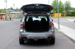 Modern SUV open trunk. Modern car with open empty trunk. Modern wagon car open trunk. Car boot is open. 