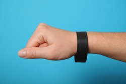 Event bracelet blank, black paper concert ticket mockup. Wristband activity accessory. Branding wristlet with sticker.