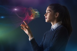 concept of a young woman selecting colors on projected rainbow color spectrum vector lines of cloud shape