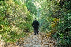 Monk walking and praying, Mount Athos