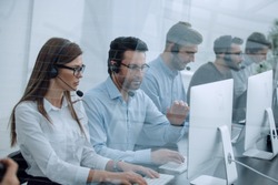 call center staff at the workplace in the office