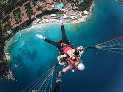 Flying on a paraglider. View of the coast from a height.