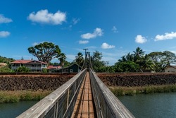 Wide shot of the Hanapepe Swinging Bridge in Kauai, Hawaii