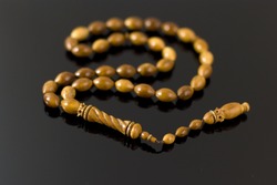 beads made ??of wood on a black background
