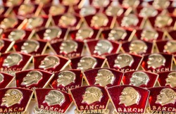 Background from the Komsomol badges of the USSR. Selective focus.  (shallow DOF)