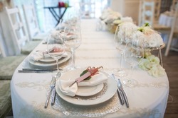 Decorated served table for wedding party or other event.