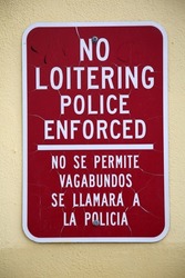 NO LOITERING sign. No Loitering Police Enforced sign. Warning sign. 