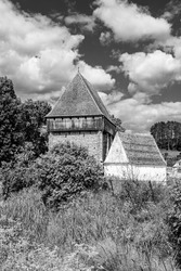 Bradeni saxon evangelical  fortified church built by German settlers in the XIV century in Bradeni village, Sibiu county, Transylvania, Romania in black  white