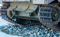 Close up view of world war tank road wheels and tracks