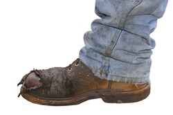 Workman's boot and jeans on a white background