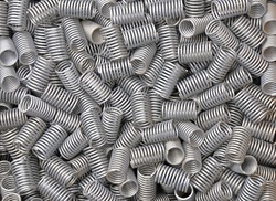 A large collection of stainless steel springs