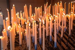lit candles at the Marian shrine in Lourdes, France