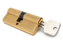 Pin tumbler of cylinder lock internal mechanism with key on white background