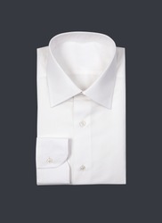 Folded white man shirt on gray background