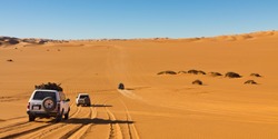 Desert Safari - Off-road vehicles driving in the Sahara Desert, Libya