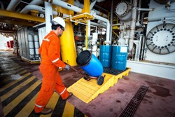 technician during transfer used oil or empty drums  to basket . 
