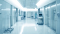 blur background of modern hospital ICU corridor interior, medical and healthcare concept