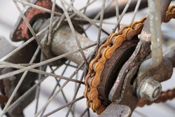 Closed up of rusty bicycle rear wheel, include chain, chain ring,
