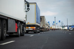 a long traffic jam of many trucks at the border , a long wait for customs checks between States due to the coronavirus epidemic, increased sanitary inspection of cargo transport