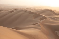 Desert landscape during early sunrise.