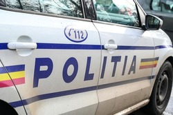 Police patrol car in Romania. Side view of a police car with the lettering 